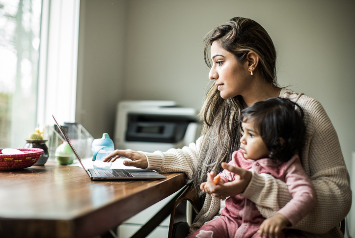 Woman and daughter on computer