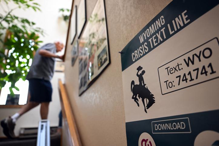 Side of a trailer in Wyoming displays crisis hotline number