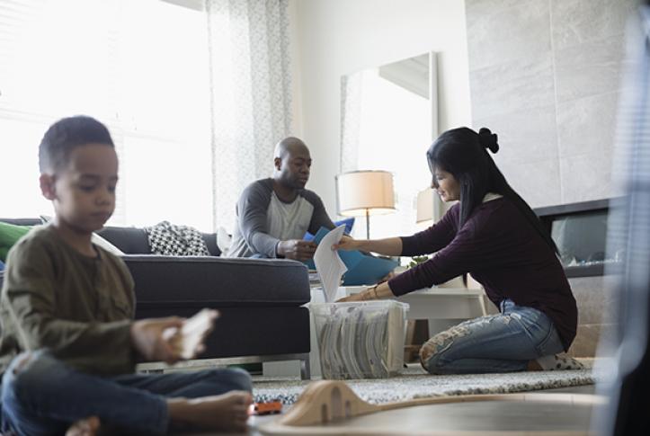 Family going thru bills for health insurance