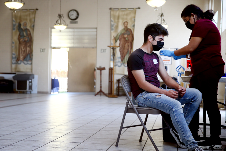 A person receiving their first dose of the COVID-19 vaccine in Los Angeles on April 9, 2021. Findings from a new study highlight the substantial impact of the U.S. vaccination program on reducing infections, hospitalizations, and deaths. Photo: Mario Tama/Getty Images