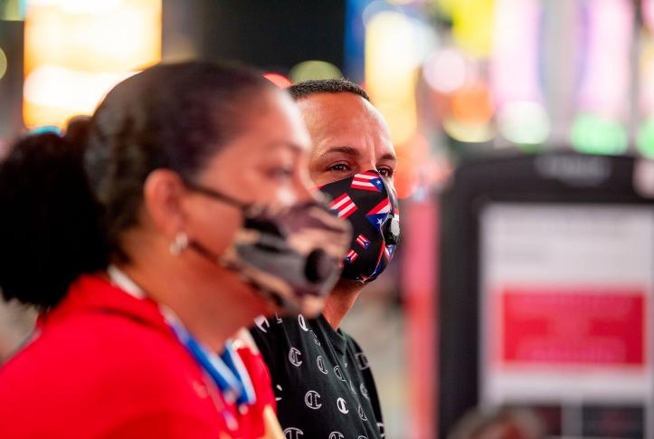 Puerto Rican New Yorkers wearing masks in Times Square New York