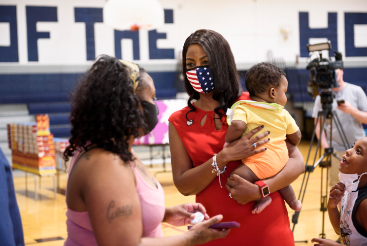St. Louis Mayor Tishaura Jones holds 7-month-old Jaylen Taylor in the Walnut Park East neighborhood of St. Louis on July 21, 2021. The local health coalition FLOURISH St. Louis brings together representatives of the city and county health departments, local health systems and health plans, and community-based organizations to reduce Black infant mortality rates through better support for families. Photo: Nick Schnelle for Washington Post via Getty Images