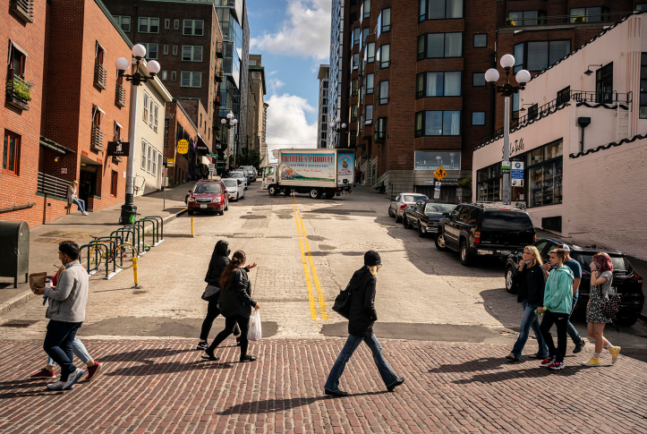 Pedestrians cross the street in Seattle