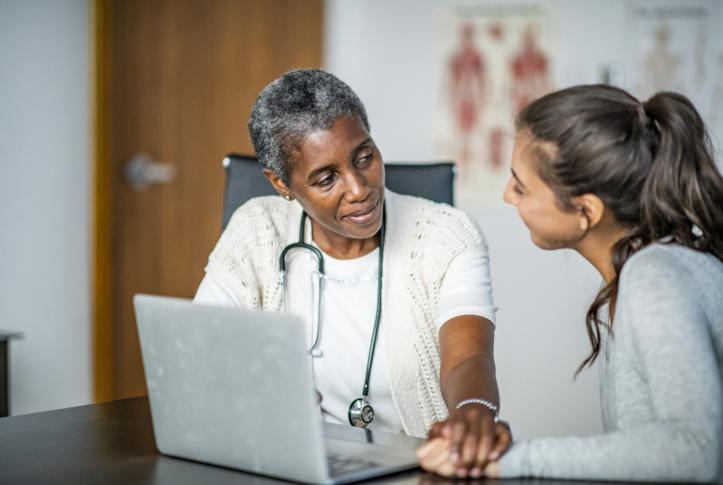 Patient in hospital being delivered care