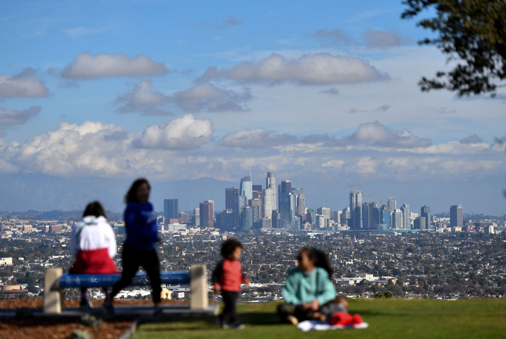 Photo, people in park with Los Angeles skyline in background