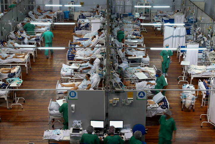 Patients affected by the COVID-19 coronavirus remain at a field hospital set up at a sports gym, in Santo Andre, Sao Paulo state, Brazil, on March 26, 2021.