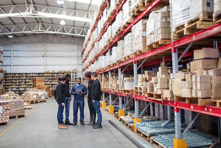 Small business meeting in warehouse