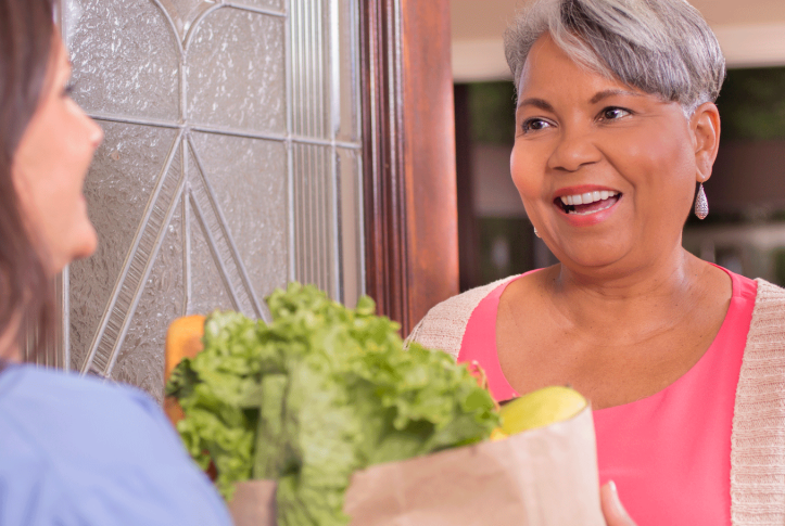woman receiving groceries
