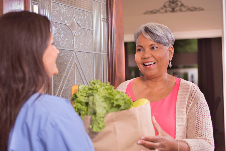 woman receiving groceries