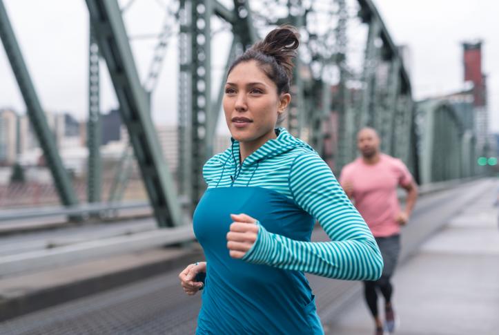 young health enrollee running