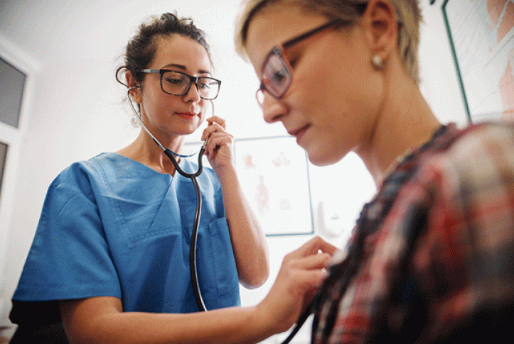 doctor examining Medicaid patient