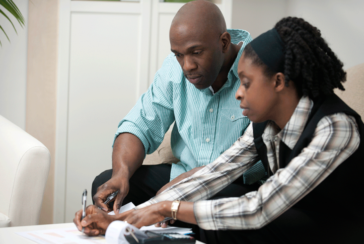 couple calculating costs