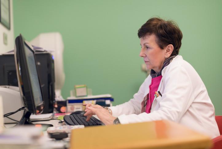 Doctor looks at digital health data