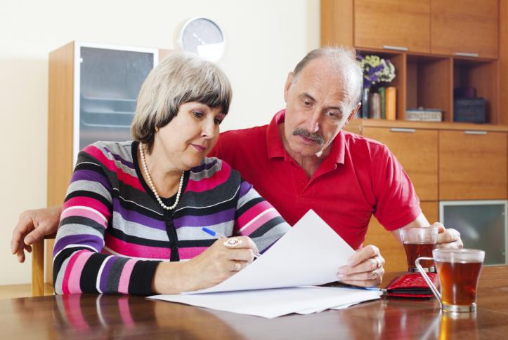 couple looking at bills