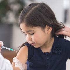 Child getting care at FQHC