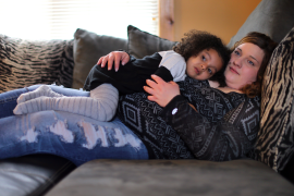Stephanie Robtoy, who suffered from addiction to prescription opioids for a decade, with her daughter in St. Albans, Vermont.
