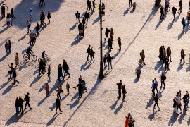 Aerial view of people walking in a square