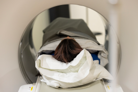 Woman in PET-CT machine