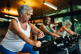 Seniors on exercise equipment