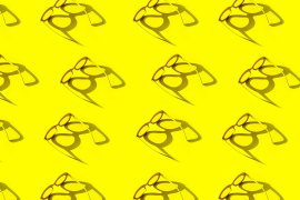 Stylized image of glasses on a yellow background
