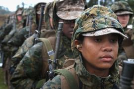 Female service members standing in a line during a training exercise