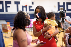 St. Louis Mayor Tishaura Jones holds 7-month-old Jaylen Taylor in the Walnut Park East neighborhood of St. Louis on July 21, 2021. The local health coalition FLOURISH St. Louis brings together representatives of the city and county health departments, local health systems and health plans, and community-based organizations to reduce Black infant mortality rates through better support for families. Photo: Nick Schnelle for Washington Post via Getty Images