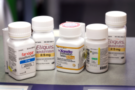 Photo, group of pill bottles on table