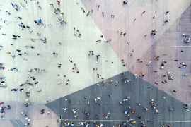 Birds eye view of people walking in a crowded square